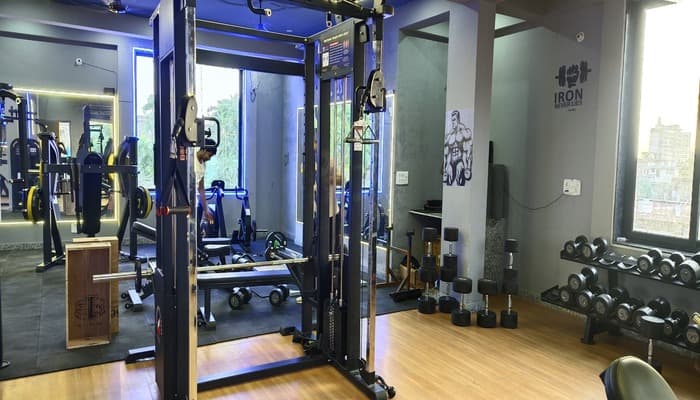 Cable station and dumbbell rack on the training floor